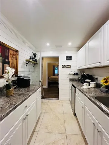 Entertaining Beverage area with large coffee bar and oversized sink