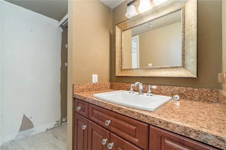 Bathroom - closet doors are off and can be put back on after painting