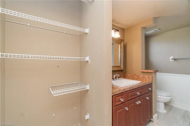 Bathroom - closet doors are off and can be put back on after painting