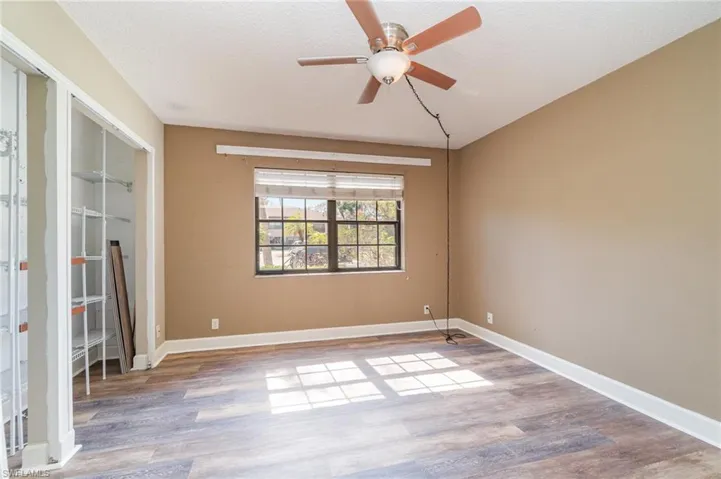 Bedroom - closet doors are off and can be put back on after painting