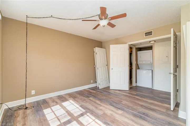 Bedroom - closet doors are off and can be put back on after painting