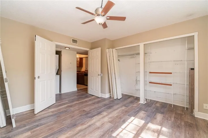 Bedroom - closet doors are off and can be put back on after painting