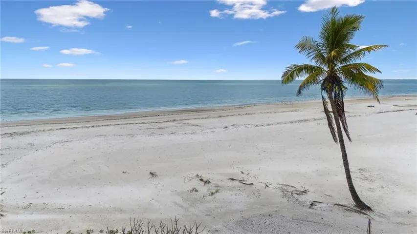 View of water feature with a beach view