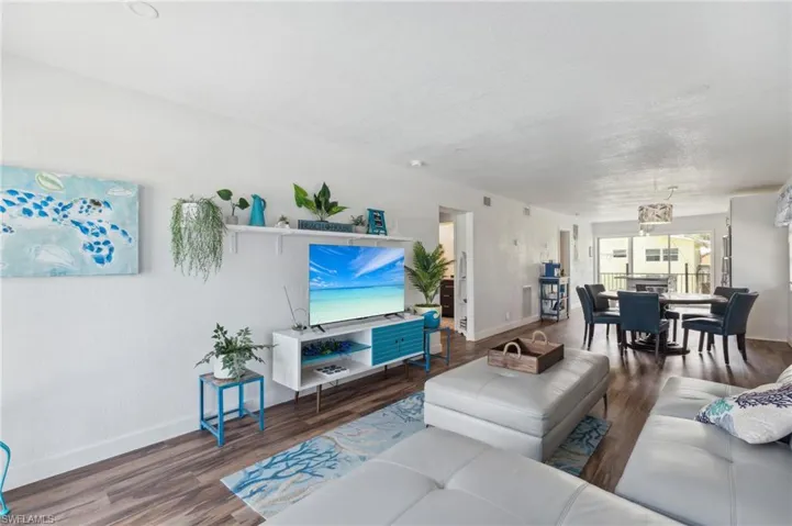Living room featuring dark hardwood / wood-style floors