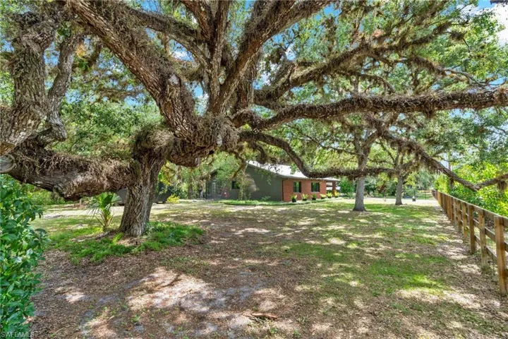 Majestic Old Florida Live Oaks scattered across this .71 acre property.  Completely fenced with 3 access gates.