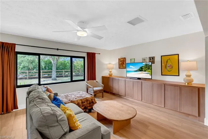 Living room offers a spacious open floor plan with LVP flooring throughout.