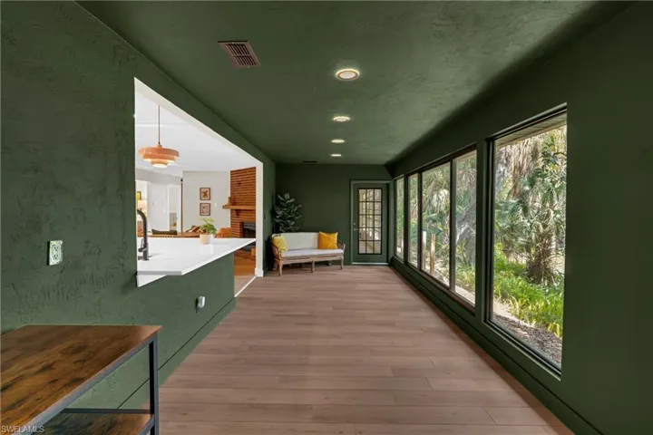 Spacious family room located off the kitchen and dining area offers many possibilities for addtional living space.