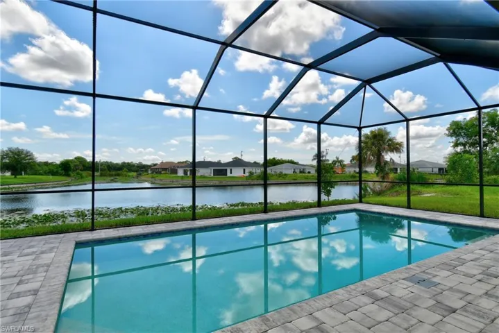 View of pool with a lanai