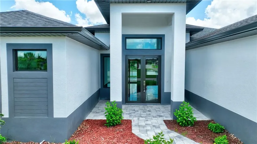 Doorway to property with french doors