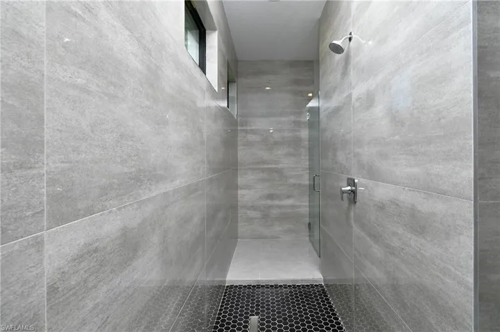 Bathroom with tiled shower