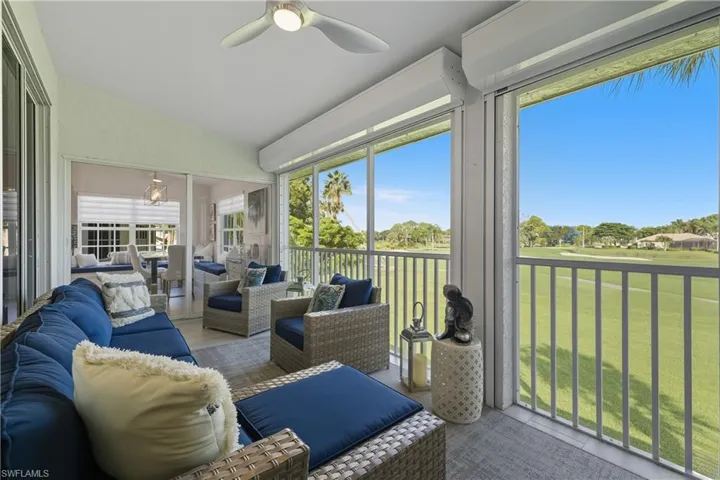Sunroom with a ceiling fan, an outdoor hangout area, golf course view, and plenty of natural light