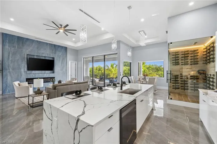 Gourmet kitchen, family room, wine room and dining area.