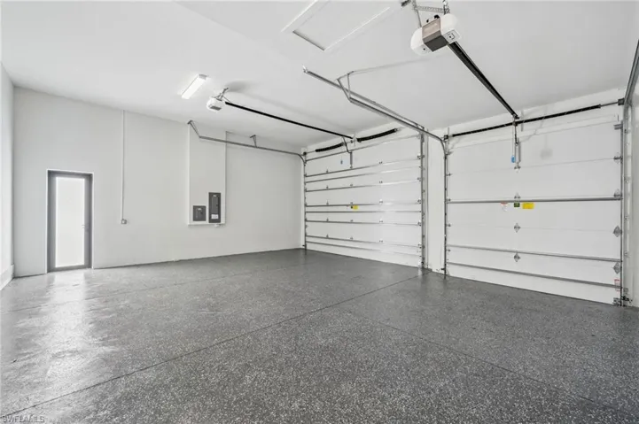 Oversized 3 Car Garage. 12 foot high garage door on the 2 car side. Ready for a big truck or boat.