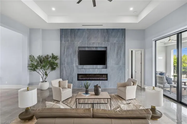 Lots of room to entertain. Come and sit by the fireplace.