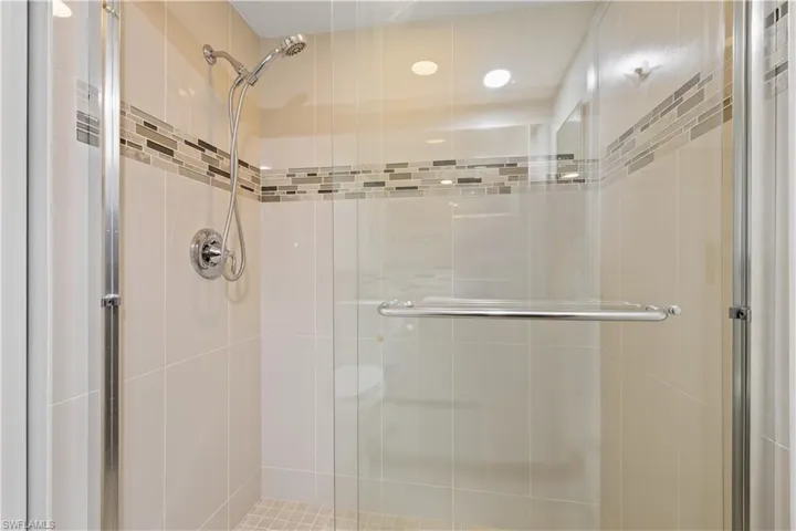 Full bath featuring a stall shower