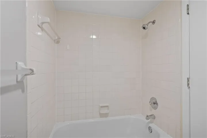 Full bathroom with shower / washtub combination