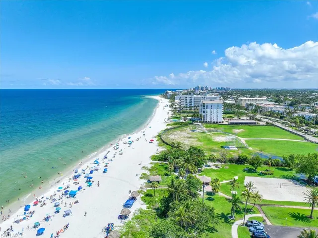 Aerial view with a beach view and a water view