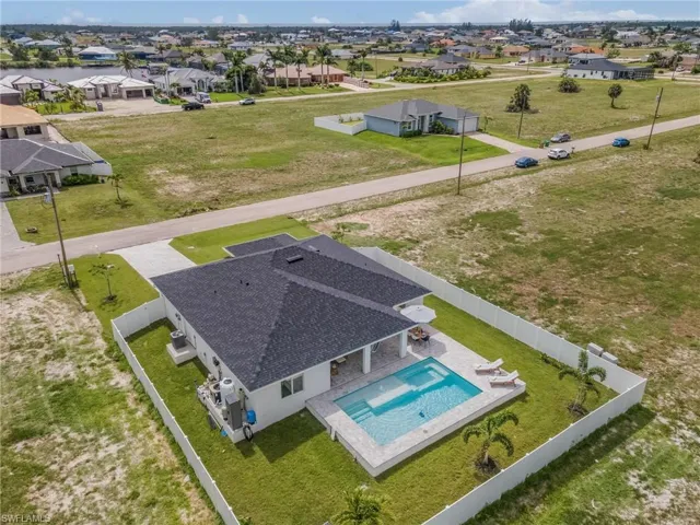 Aerial view of residential area with a pool area
