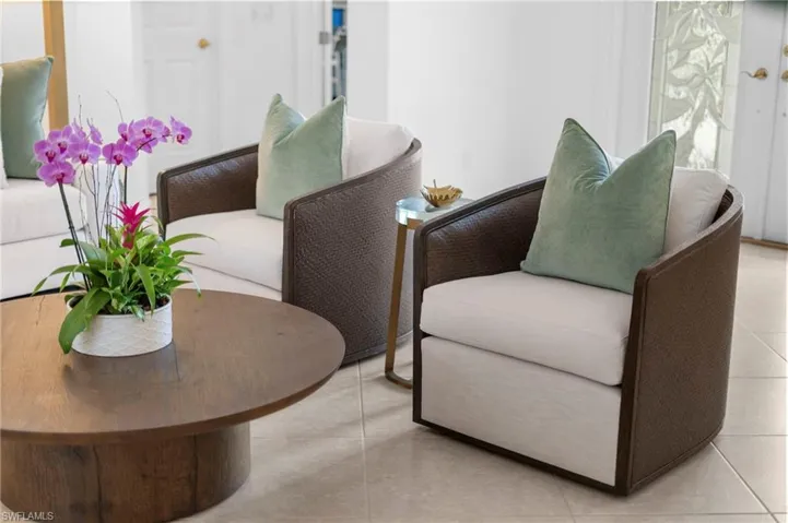 Sitting room featuring light tile patterned floors