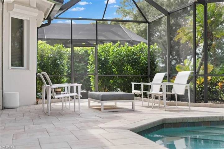 View of pool featuring a lanai and a patio
