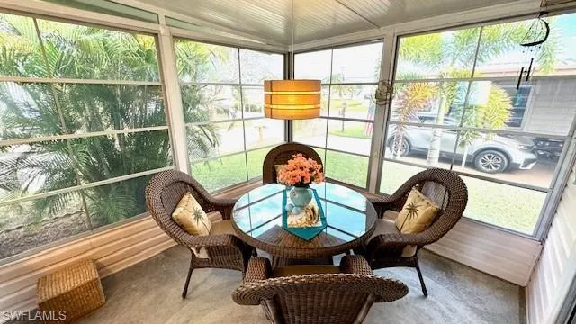 Sunroom featuring a healthy amount of sunlight