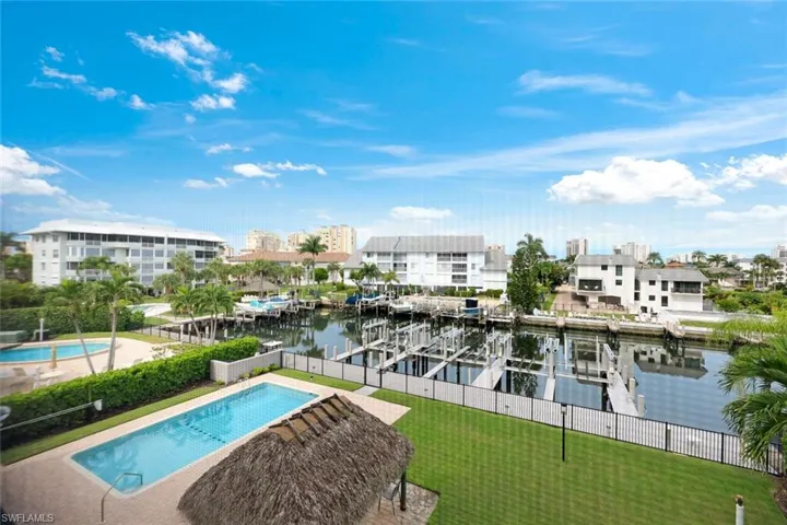 Heated community pool overlooking the canal