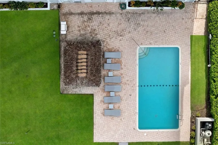 Overhead view of the pool and poolside tiki hut