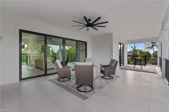 View of patio / terrace featuring ceiling fan