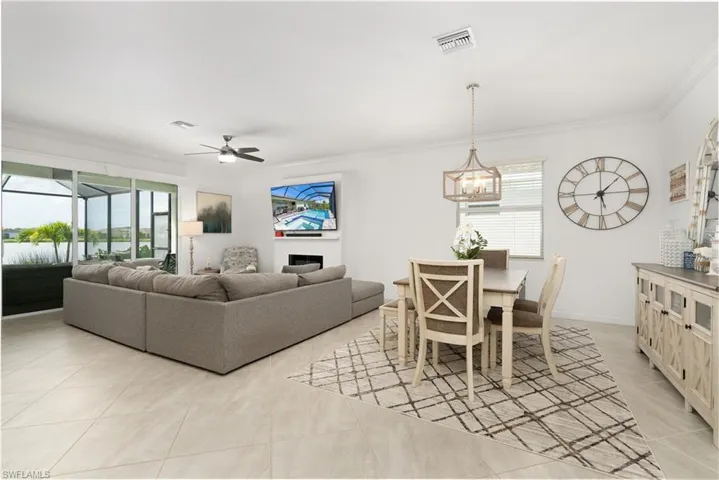 View from the kitchen to the seamlessly connected living and dining areas.
