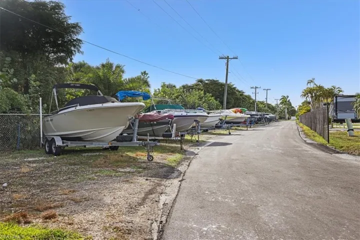 View of street featuring view of wooded area