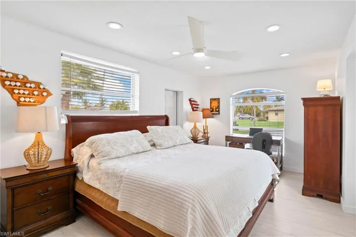 Bedroom featuring a ceiling fan and recessed lighting