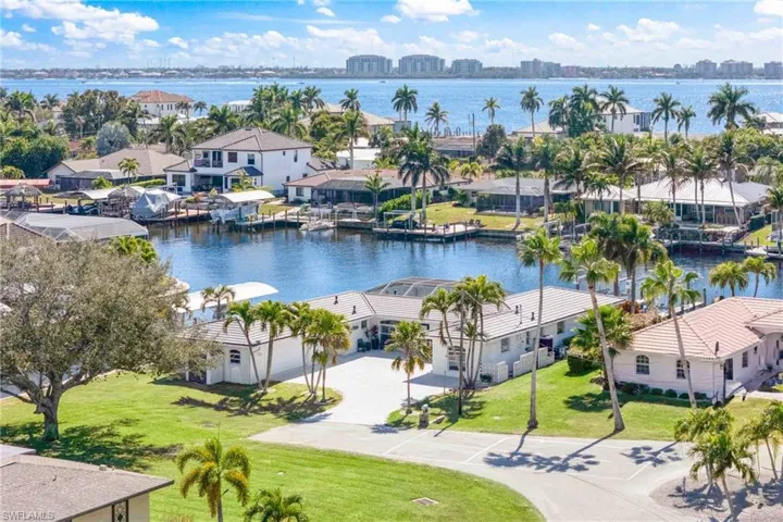 View of urban area with a large body of water and nearby suburban area