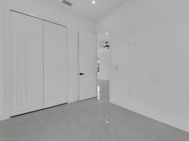 Unfurnished bedroom featuring a closet and recessed lighting