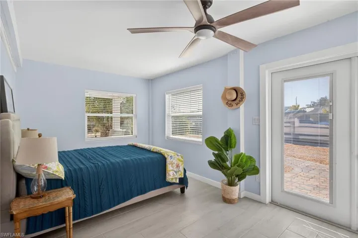 Bedroom featuring ceiling fan and light wood finished floors