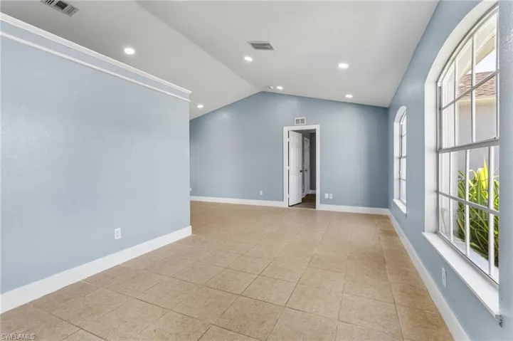 Spare room featuring light tile patterned floors and recessed lighting