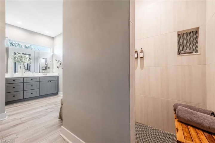 Primary Bath features double vanities and a great walk in shower!
