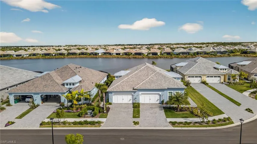 Aerial view of residential area with a large body of water
