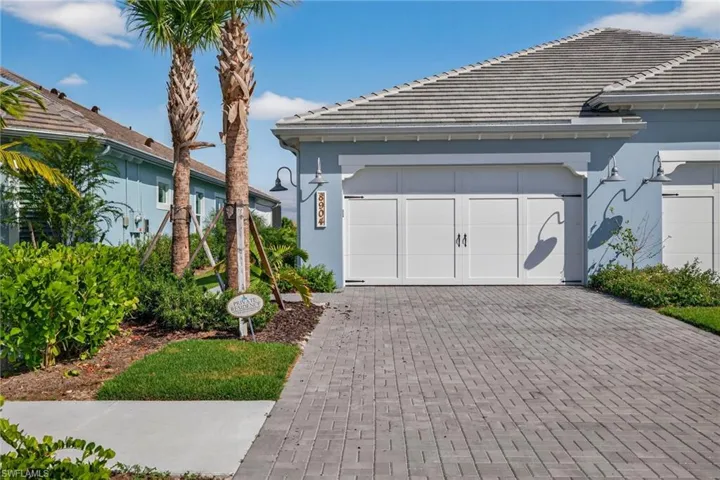 Garage with decorative driveway