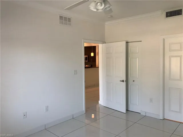 White paneled doors with chrome hardware