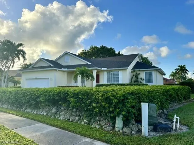 Single story home with a garage