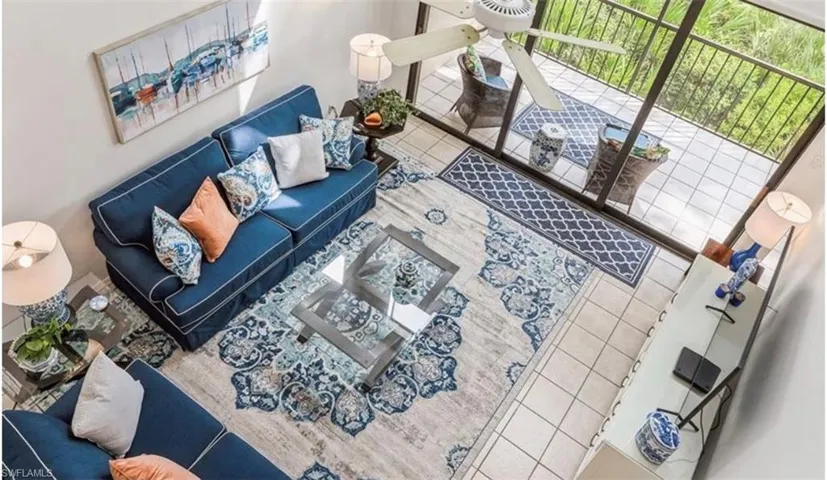 Living area featuring tile patterned flooring