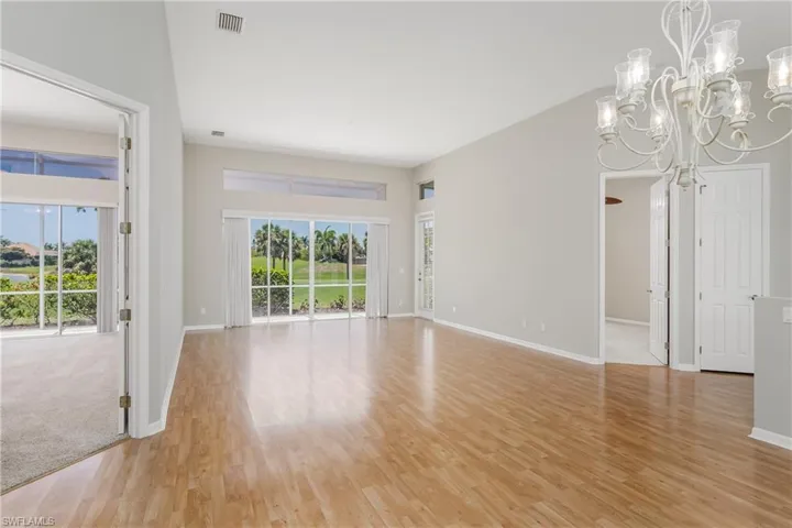 Primary Bedroom is off Living Room to the LEFT.
