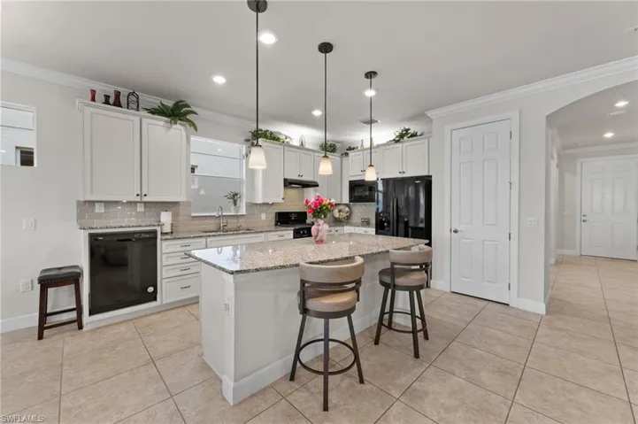 Light bright kitchen, pantry behind door