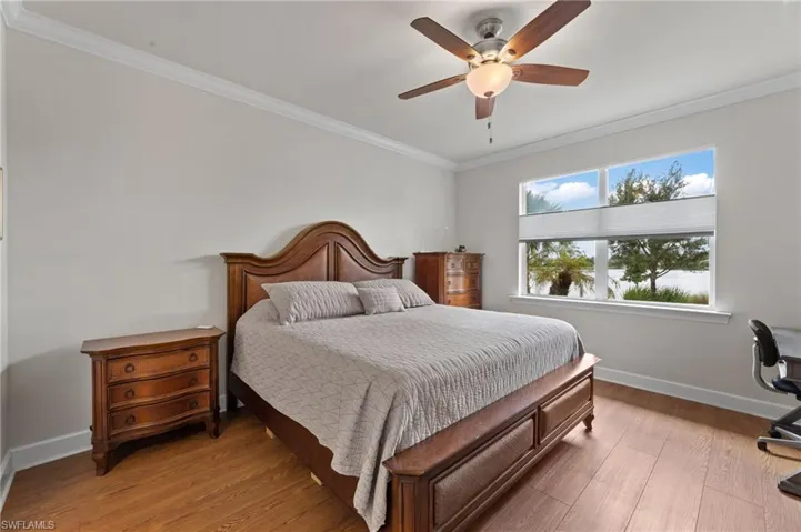 Master bedroom w/beautiful view of lake