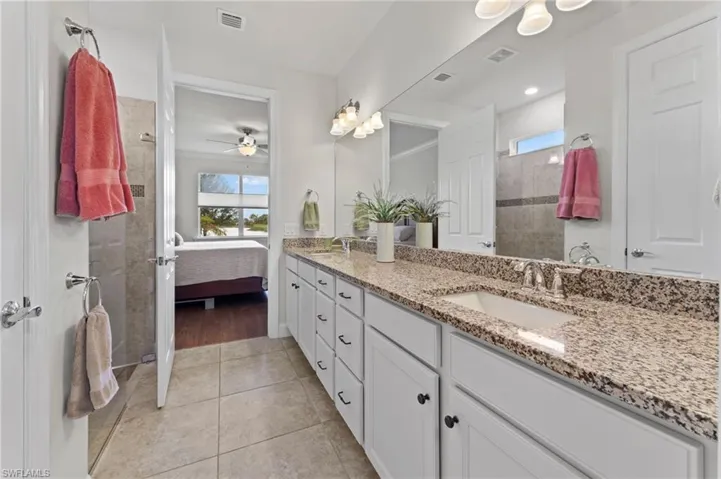 Large walk-in shower on left