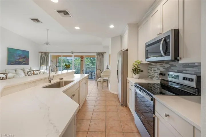 Kitchen with Stainless Steel Appliances, Quartz Counter Tops