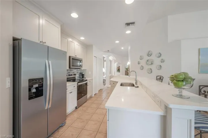 Kitchen with Large Double Door Refrigerator