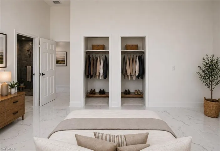 Spacious room featuring high ceilings and polished tile flooring. Image digitally enhanced and virtually altered; actual property condition may differ..