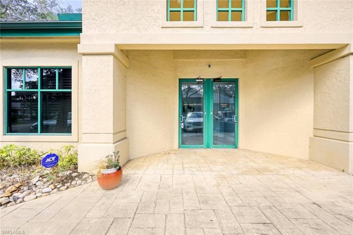 the entrance to the Doctors office is very inviting and professional.