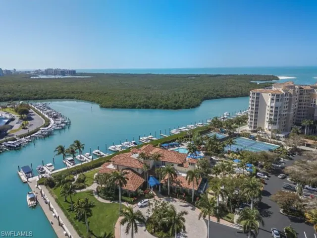 Aerial view of a large body of water and numerous boat docks